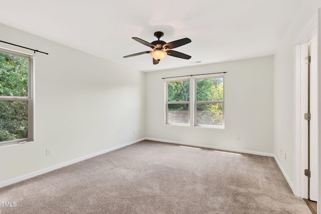 4520 Middletown Dr, Wake Forest, NC 27587 - unfurnished room featuring healthy amount of natural light, carpet flooring, and ceiling fan