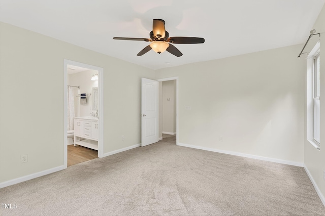 4520 Middletown Dr, Wake Forest, NC 27587 - unfurnished bedroom featuring carpet flooring, ensuite bath, and a ceiling fan