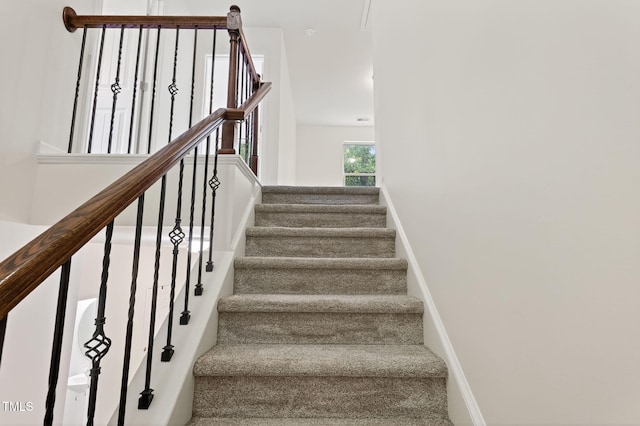 4520 Middletown Dr, Wake Forest, NC 27587 - staircase featuring baseboards