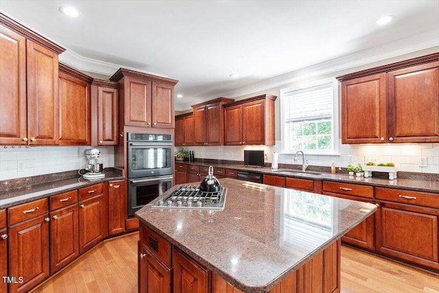 7804 Percussion Dr, Apex, NC 27539 - kitchen featuring stainless steel appliances, crown molding, light wood-style floors, decorative backsplash, and recessed lighting