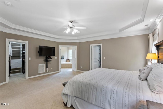 7804 Percussion Dr, Apex, NC 27539 - bedroom with a walk in closet, light colored carpet, ornamental molding, ensuite bathroom, and ceiling fan