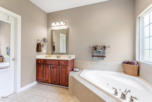 7804 Percussion Dr, Apex, NC 27539 - full bathroom featuring vanity, a jetted tub, tile patterned floors, and plenty of natural light
