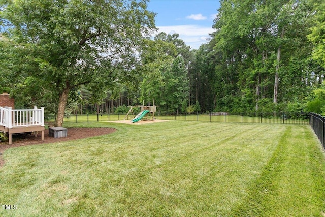 7804 Percussion Dr, Apex, NC 27539 - fenced backyard with a playground