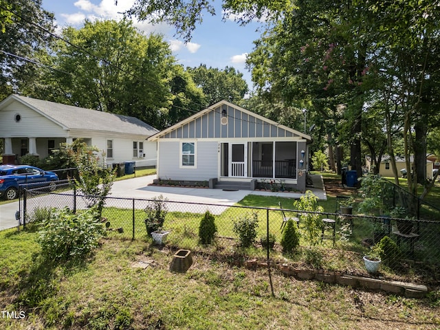 304 Spring St, Durham, NC 27703 - rear view of property with board and batten siding