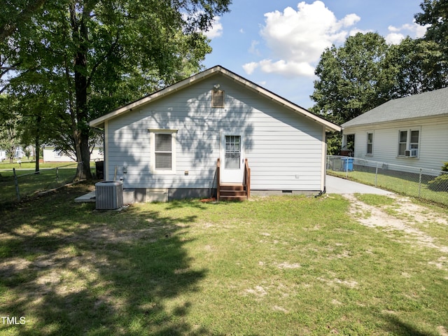 304 Spring St, Durham, NC 27703 - rear view of property featuring entry steps, a fenced backyard, crawl space, and driveway