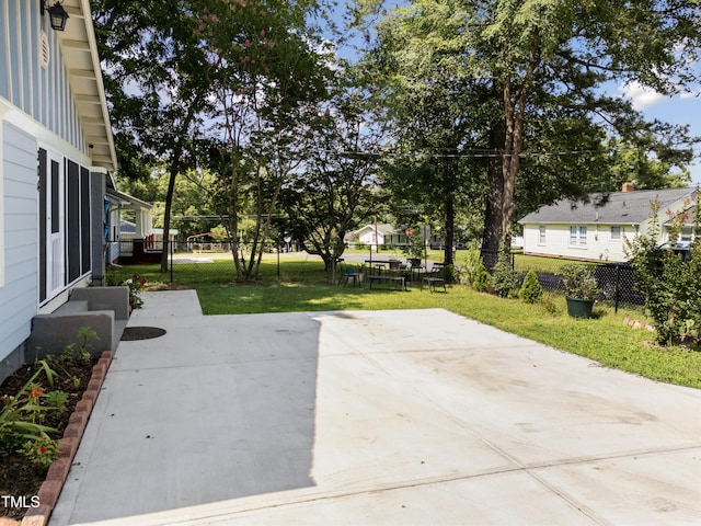 304 Spring St, Durham, NC 27703 - fenced backyard featuring a patio area and entry steps