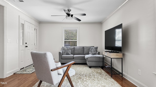 304 Spring St, Durham, NC 27703 - living room featuring wood finished floors, crown molding, and a ceiling fan