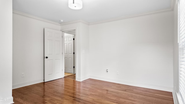 304 Spring St, Durham, NC 27703 - unfurnished bedroom with wood finished floors and ornamental molding