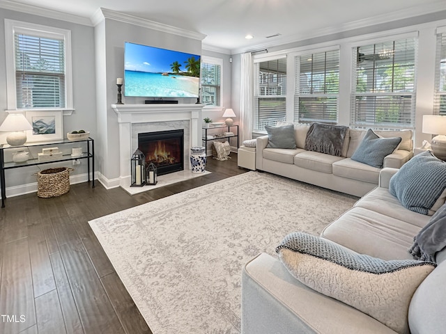 2438 Braxton Wood Ln, Apex, NC 27523 - living room with ornamental molding, a premium fireplace, dark wood-style flooring, and recessed lighting