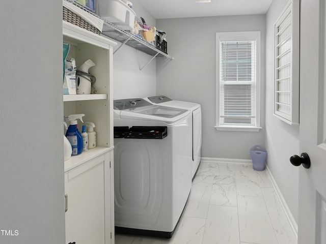 2438 Braxton Wood Ln, Apex, NC 27523 - washroom featuring washing machine and clothes dryer and light marble finish flooring