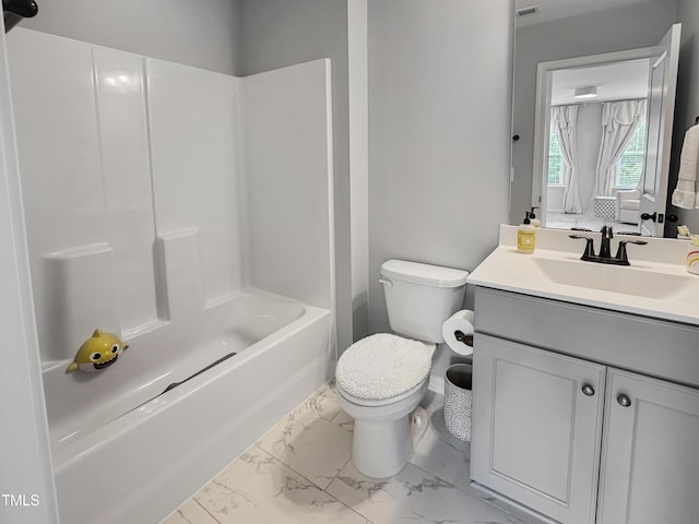 2438 Braxton Wood Ln, Apex, NC 27523 - bathroom featuring marble look tile flooring, vanity, and bathtub / shower combination