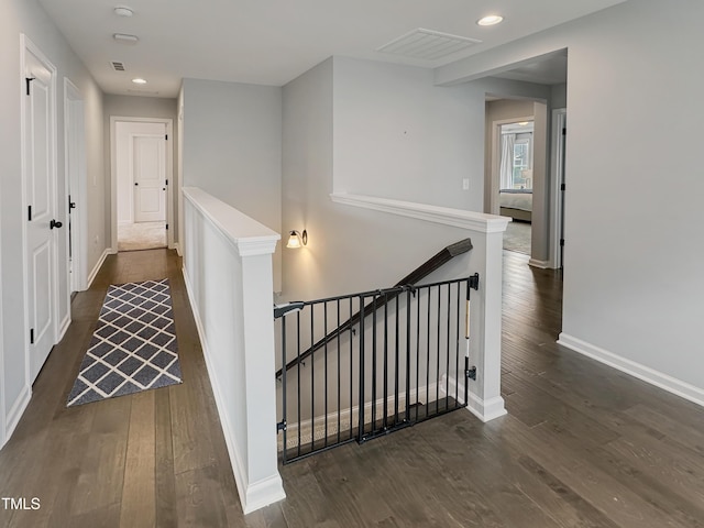 2438 Braxton Wood Ln, Apex, NC 27523 - hallway featuring an upstairs landing, wood finished floors, and recessed lighting