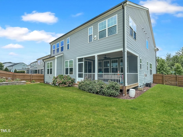 2438 Braxton Wood Ln, Apex, NC 27523 - rear view of house featuring a sunroom and a ceiling fan