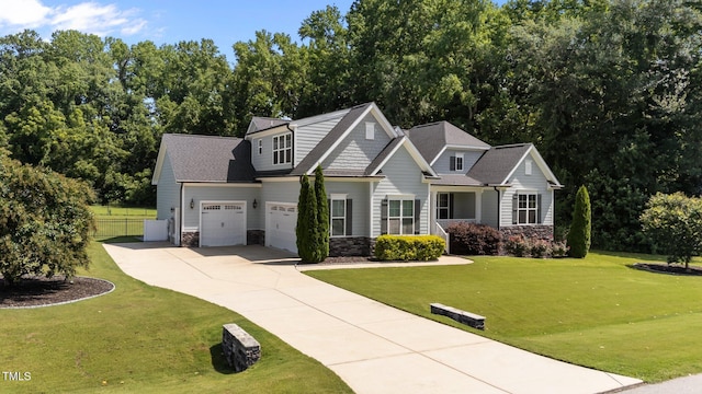4125 Olde Judd Dr, Willow Springs, NC 27592 - craftsman-style home with stone siding, concrete driveway, and a garage
