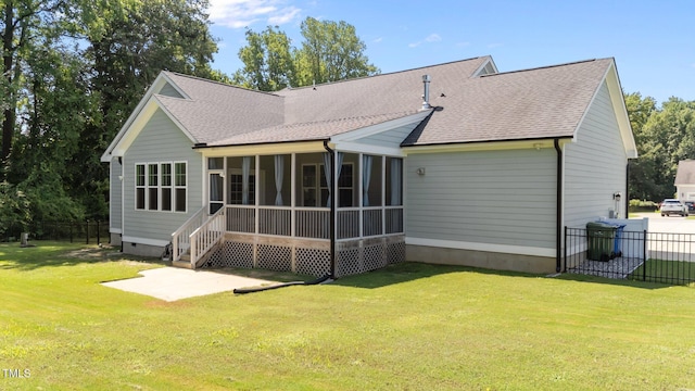 4125 Olde Judd Dr, Willow Springs, NC 27592 - rear view of house with a sunroom, a patio, and roof with shingles