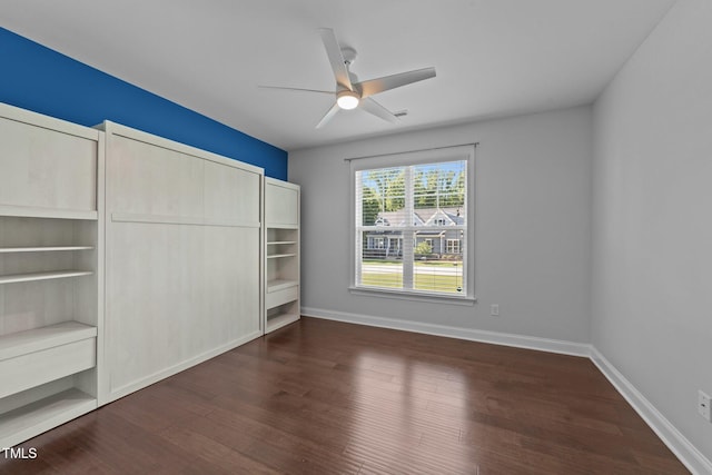 4125 Olde Judd Dr, Willow Springs, NC 27592 - unfurnished bedroom featuring dark wood finished floors and a ceiling fan