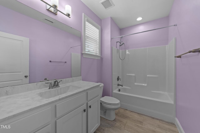 4125 Olde Judd Dr, Willow Springs, NC 27592 - bathroom featuring vanity, wood finished floors, and tub / shower combination