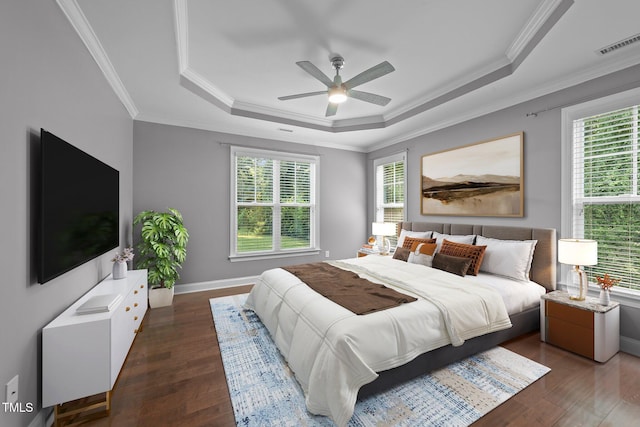 4125 Olde Judd Dr, Willow Springs, NC 27592 - bedroom with a tray ceiling, multiple windows, wood finished floors, and ornamental molding