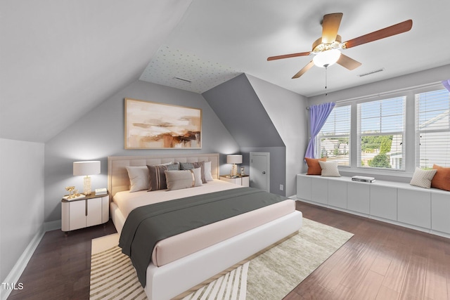 4125 Olde Judd Dr, Willow Springs, NC 27592 - bedroom featuring dark wood-style floors, vaulted ceiling, and a ceiling fan