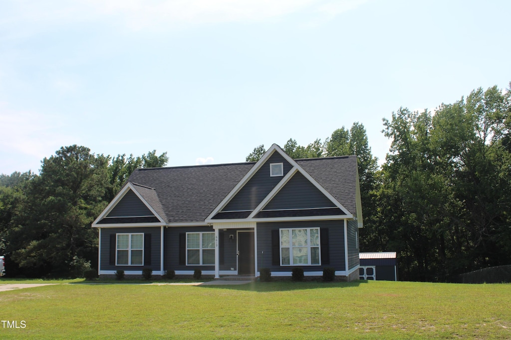 6619 Gabriels Way, Lucama, NC 27851 - view of front of property with a front lawn and roof with shingles