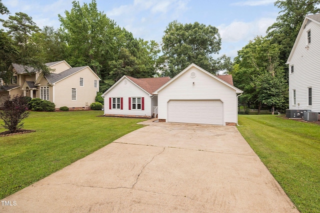 1010 Oakgrove Dr, Knightdale, NC 27545 - view of front of property featuring driveway, an attached garage, and a front lawn