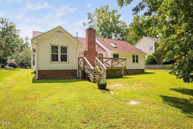 1010 Oakgrove Dr, Knightdale, NC 27545 - back of property with a deck, a chimney, and crawl space
