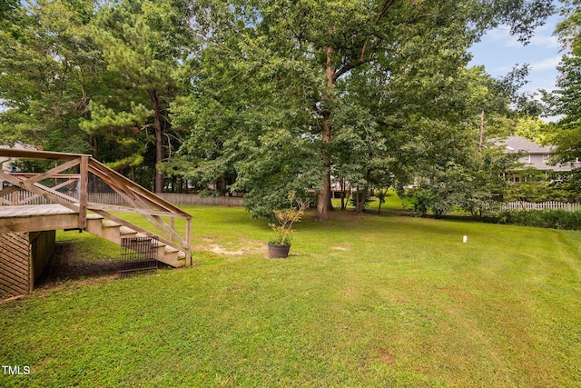 1010 Oakgrove Dr, Knightdale, NC 27545 - view of yard featuring stairs and a wooden deck