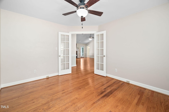 1010 Oakgrove Dr, Knightdale, NC 27545 - spare room featuring french doors, ceiling fan, and light wood finished floors