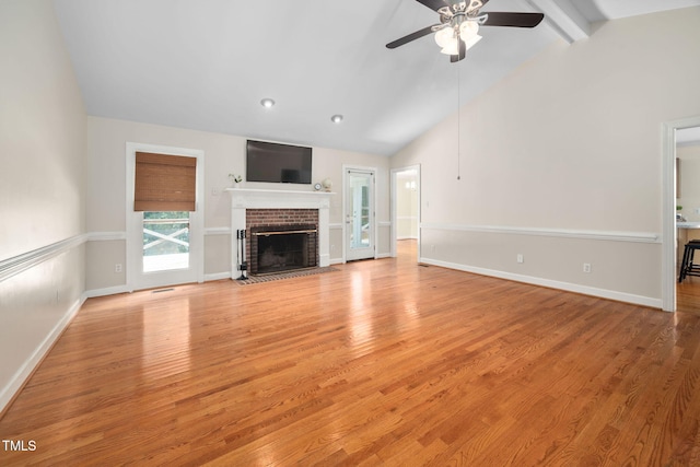 1010 Oakgrove Dr, Knightdale, NC 27545 - unfurnished living room with a ceiling fan, light wood finished floors, a brick fireplace, and recessed lighting