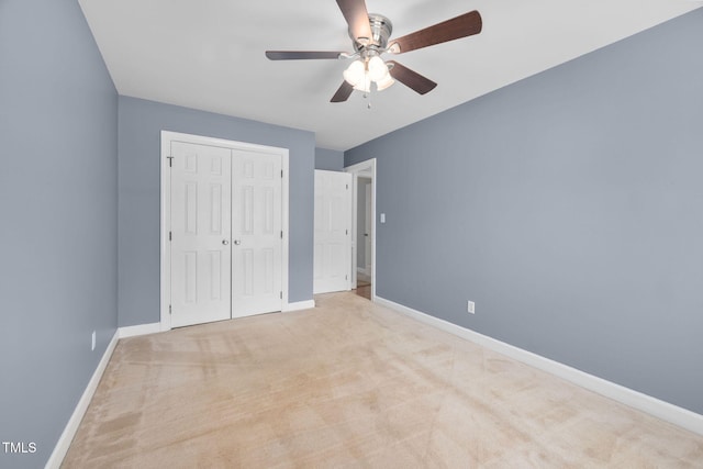 1010 Oakgrove Dr, Knightdale, NC 27545 - unfurnished bedroom with carpet floors, a closet, and ceiling fan