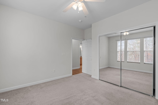 232 Eyam Hall Ln, Apex, NC 27502 - unfurnished bedroom with carpet floors, a closet, and ceiling fan