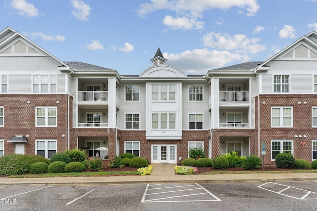 232 Eyam Hall Ln, Apex, NC 27502 - view of property featuring uncovered parking