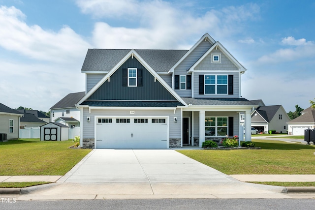 3206 Dandelion Dr, Grimesland, NC 27837 - craftsman inspired home featuring board and batten siding, concrete driveway, a front lawn, a shed, and stone siding