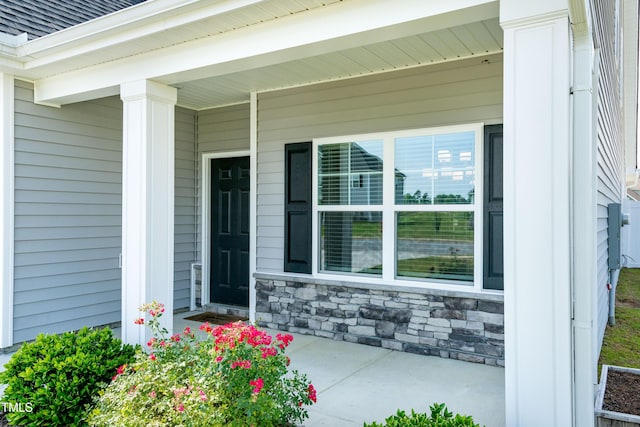 3206 Dandelion Dr, Grimesland, NC 27837 - entrance to property with covered porch and stone siding