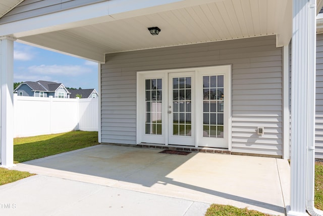 3206 Dandelion Dr, Grimesland, NC 27837 - property entrance featuring a patio area and french doors