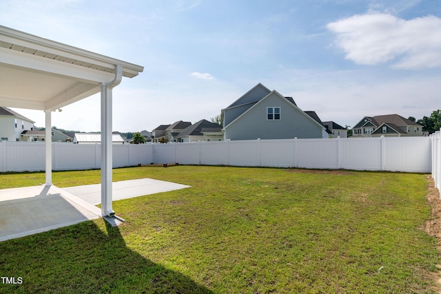 3206 Dandelion Dr, Grimesland, NC 27837 - fenced backyard featuring a patio and a residential view