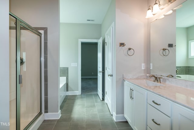 3206 Dandelion Dr, Grimesland, NC 27837 - bathroom with a bath, vanity, a stall shower, tile patterned floors, and a chandelier