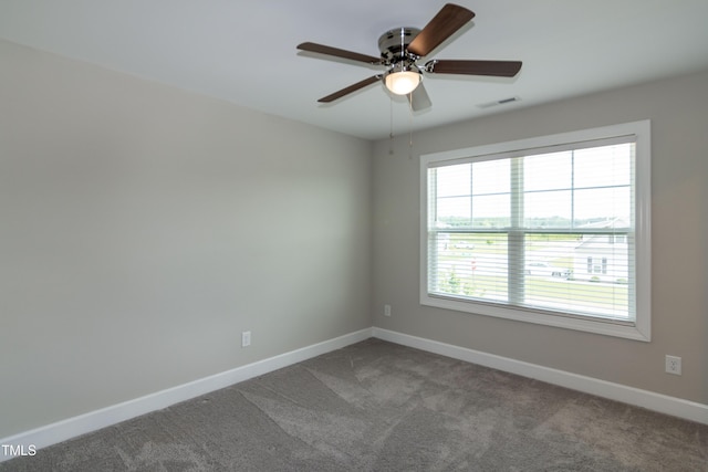 3206 Dandelion Dr, Grimesland, NC 27837 - carpeted spare room featuring baseboards and ceiling fan