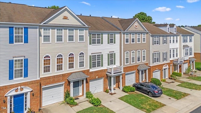 309 Ruby Walk Dr, Morrisville, NC 27560 - multi unit property featuring brick siding, driveway, and an attached garage