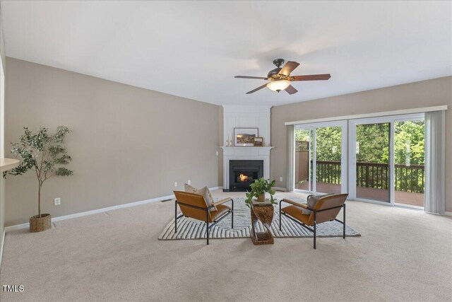 309 Ruby Walk Dr, Morrisville, NC 27560 - living area featuring a fireplace, light colored carpet, and ceiling fan