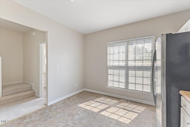 309 Ruby Walk Dr, Morrisville, NC 27560 - empty room with baseboards and stairway