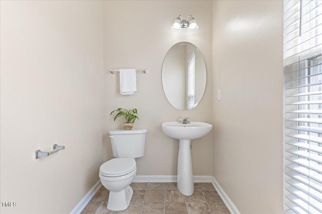 309 Ruby Walk Dr, Morrisville, NC 27560 - bathroom featuring baseboards and toilet