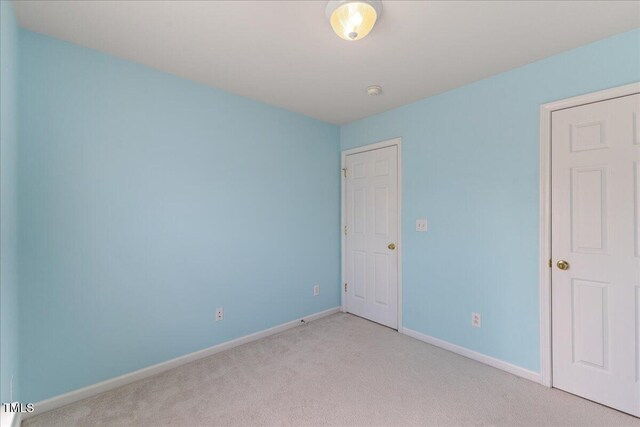 309 Ruby Walk Dr, Morrisville, NC 27560 - unfurnished bedroom featuring carpet floors