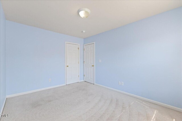 309 Ruby Walk Dr, Morrisville, NC 27560 - carpeted empty room featuring baseboards