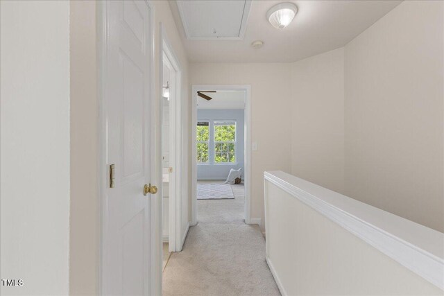 309 Ruby Walk Dr, Morrisville, NC 27560 - hall with light carpet, attic access, and an upstairs landing
