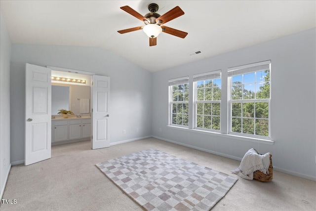 309 Ruby Walk Dr, Morrisville, NC 27560 - unfurnished bedroom featuring light colored carpet, lofted ceiling, ensuite bath, and a ceiling fan
