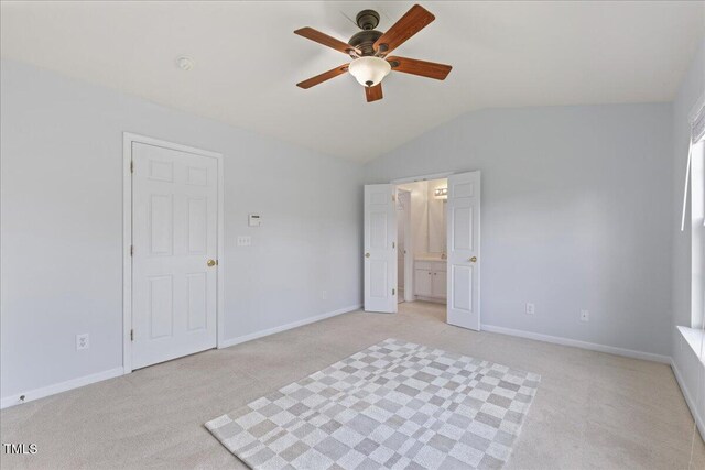309 Ruby Walk Dr, Morrisville, NC 27560 - unfurnished bedroom with light carpet, lofted ceiling, ensuite bathroom, and ceiling fan