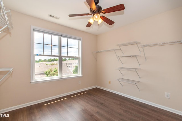 10119 Glen Autumn Rd, Raleigh, NC 27617 - walk in closet with dark wood-type flooring and ceiling fan