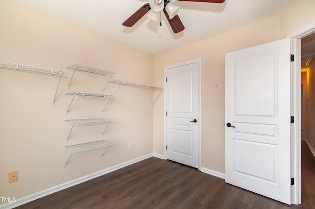 10119 Glen Autumn Rd, Raleigh, NC 27617 - spacious closet with dark wood-type flooring and ceiling fan