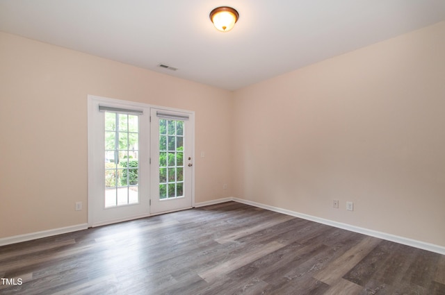 10119 Glen Autumn Rd, Raleigh, NC 27617 - unfurnished room featuring dark wood-type flooring and baseboards